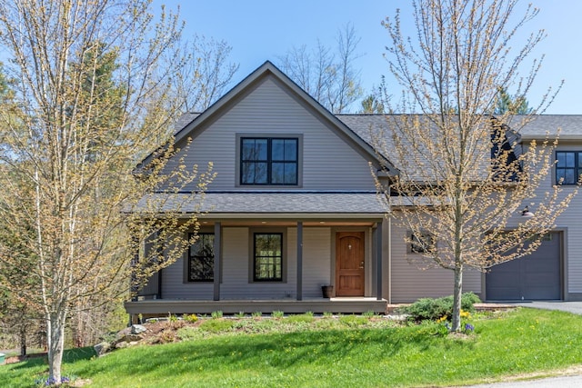 456 Thomas Ln, Stowe, VT 05672 - view of front facade featuring covered porch, a front yard, driveway, and a shingled roof