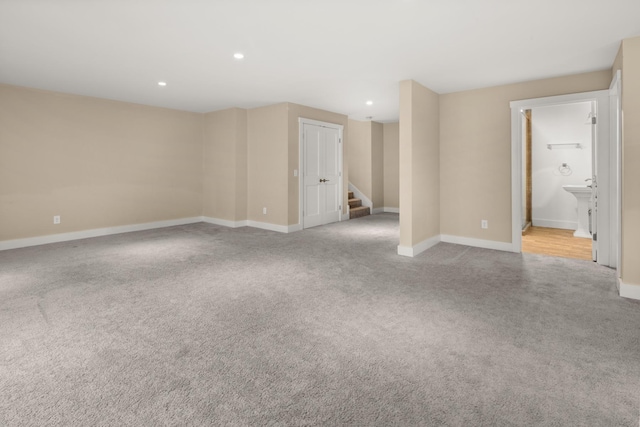 456 Thomas Ln, Stowe, VT 05672 - spare room with carpet, baseboards, stairway, and recessed lighting