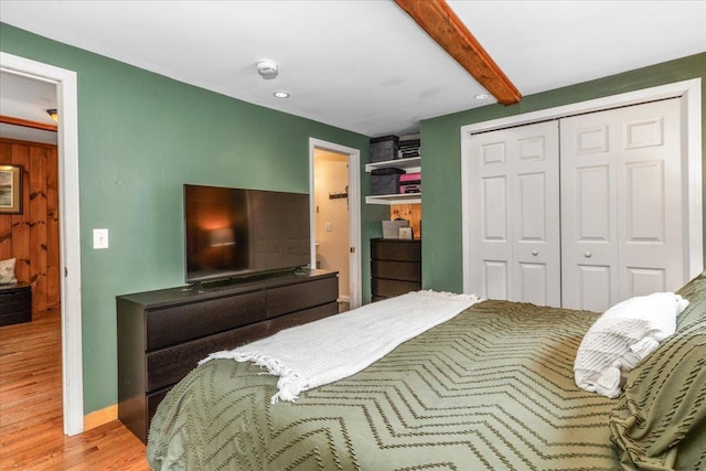 27 Eden St, Goffstown, NH 03102 - bedroom featuring wood finished floors, a closet, beamed ceiling, recessed lighting, and baseboards