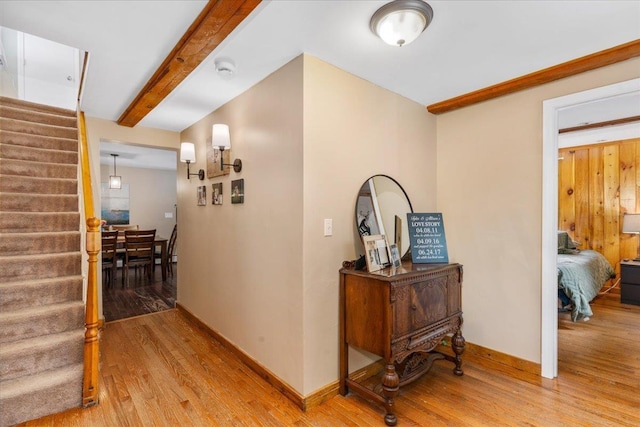 27 Eden St, Goffstown, NH 03102 - corridor featuring light wood-type flooring, stairs, baseboards, and beam ceiling