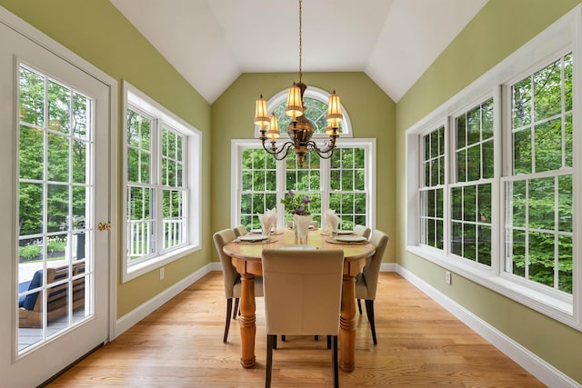 15 Largo Knl, Milford, NH 03055 - sunroom with french doors, a chandelier, wood finished floors, lofted ceiling, and baseboards