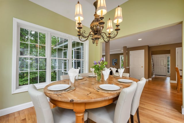15 Largo Knl, Milford, NH 03055 - dining room featuring baseboards, a chandelier, and light wood-type flooring
