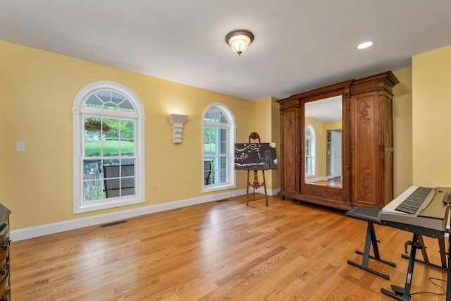 15 Largo Knl, Milford, NH 03055 - workout area featuring light wood-style flooring, baseboards, and recessed lighting