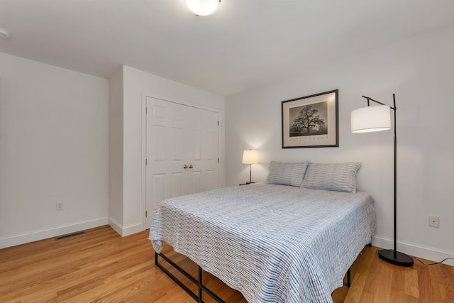 15 Largo Knl, Milford, NH 03055 - bedroom featuring light wood-style floors, baseboards, and a closet