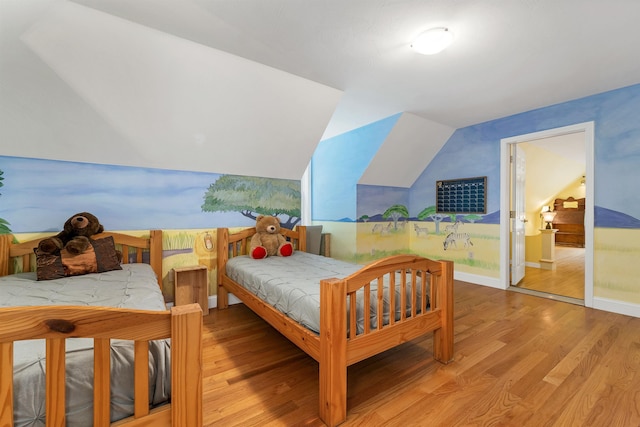 15 Largo Knl, Milford, NH 03055 - bedroom featuring light wood-style flooring, lofted ceiling, and baseboards