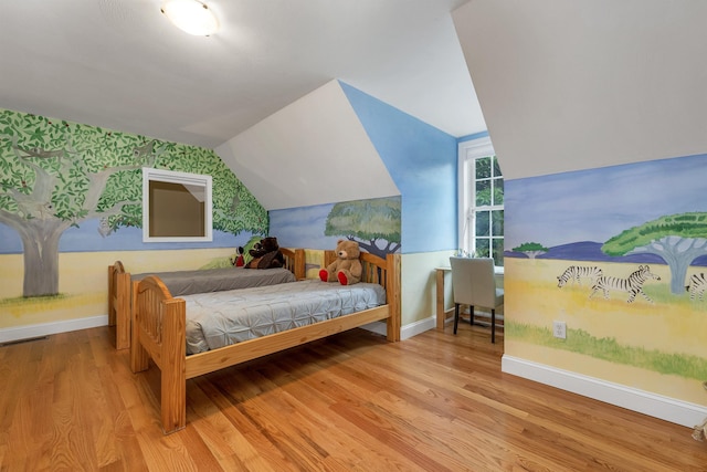 15 Largo Knl, Milford, NH 03055 - bedroom with baseboards, vaulted ceiling, wood finished floors, and wallpapered walls