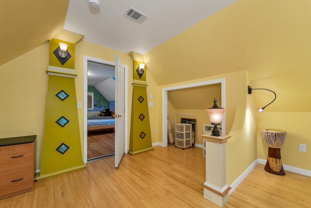 15 Largo Knl, Milford, NH 03055 - bonus room featuring light wood finished floors, vaulted ceiling, and baseboards