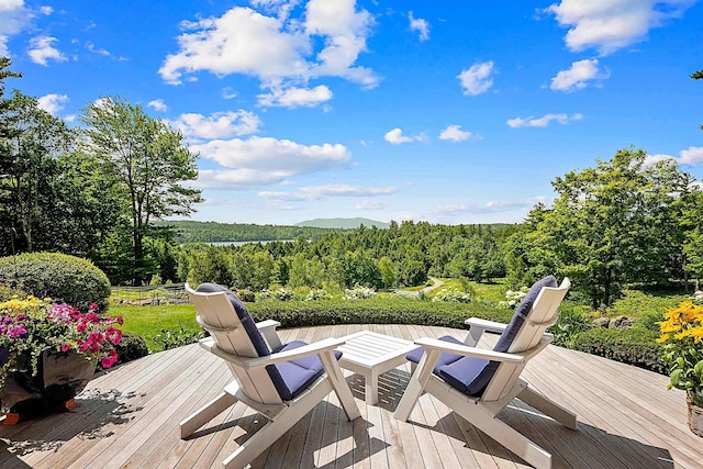 1452 Little Sunapee Rd, New London, NH 03257 - wooden deck featuring a forest view