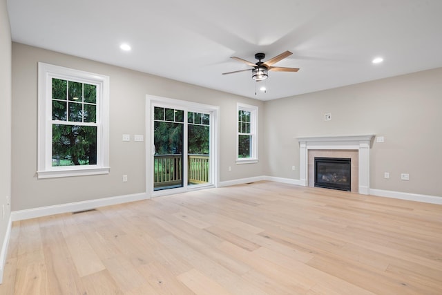 214 Pembroke St Unit A, Pembroke, NH 03275 - unfurnished living room featuring plenty of natural light, ceiling fan, light wood-style floors, and recessed lighting