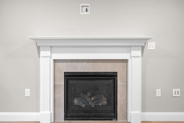 214 Pembroke St Unit A, Pembroke, NH 03275 - detailed view of a fireplace and baseboards