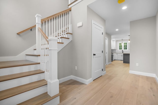 214 Pembroke St Unit A, Pembroke, NH 03275 - stairs with wood finished floors, recessed lighting, and baseboards