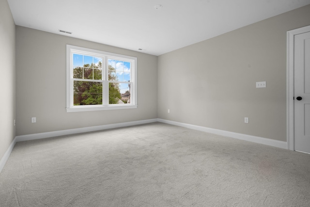 214 Pembroke St Unit A, Pembroke, NH 03275 - carpeted spare room with baseboards