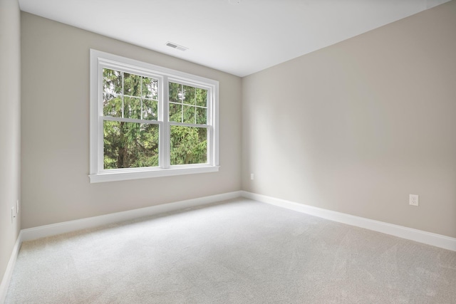 214 Pembroke St Unit A, Pembroke, NH 03275 - carpeted spare room featuring baseboards