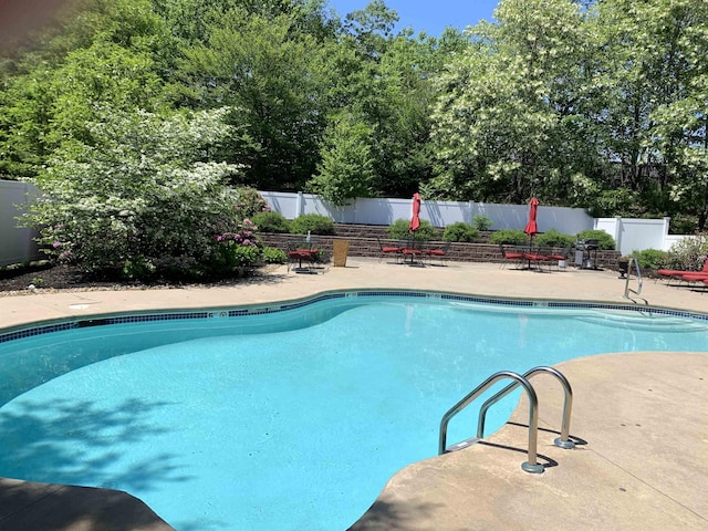 54 Cielo Dr, Dover, NH 03820 - community pool with a patio