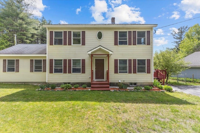 354 Falls Bridge Rd, Williamstown, VT 05679 - colonial house featuring a chimney, a front lawn, and entry steps