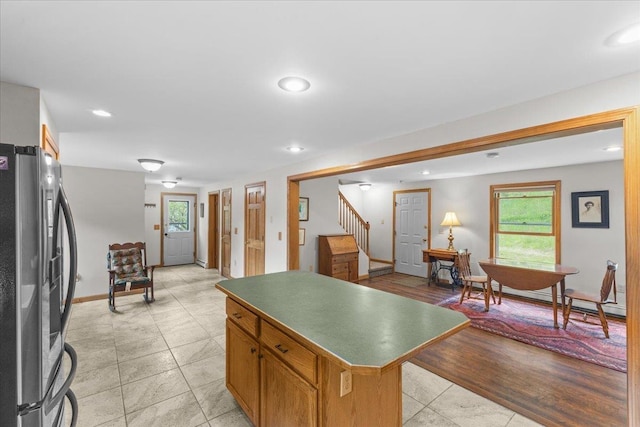 354 Falls Bridge Rd, Williamstown, VT 05679 - kitchen featuring stainless steel fridge, plenty of natural light, a kitchen island, recessed lighting, and a baseboard heating unit