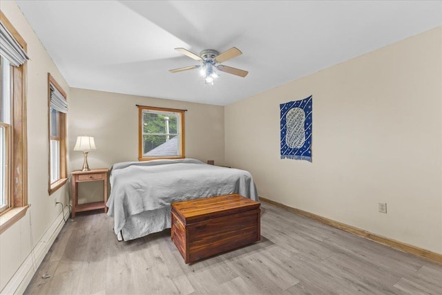 354 Falls Bridge Rd, Williamstown, VT 05679 - bedroom with light wood-style flooring and a ceiling fan