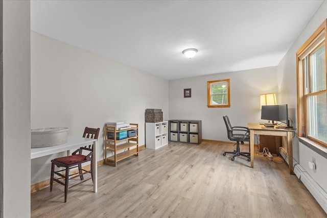 354 Falls Bridge Rd, Williamstown, VT 05679 - office space featuring wood finished floors and a baseboard heating unit