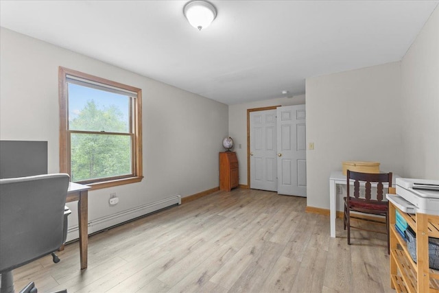354 Falls Bridge Rd, Williamstown, VT 05679 - office space featuring a baseboard radiator and light wood-style floors