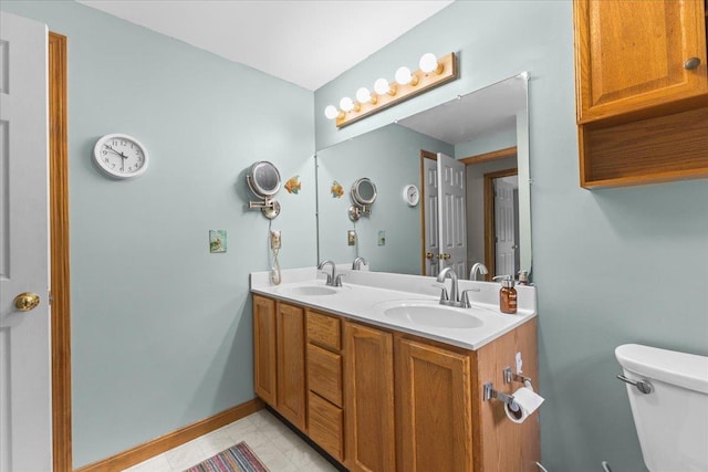 354 Falls Bridge Rd, Williamstown, VT 05679 - bathroom with double vanity and tile patterned floors