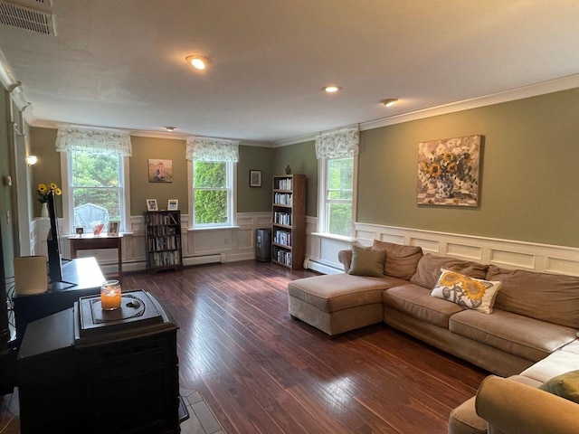 139 Rice Brook Dr, Stoddard, NH 03464 - living area featuring baseboard heating, ornamental molding, dark wood-style floors, a decorative wall, and a wainscoted wall