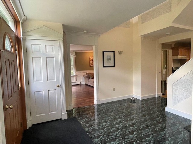 139 Rice Brook Dr, Stoddard, NH 03464 - foyer featuring dark marble finish floors and a baseboard heating unit