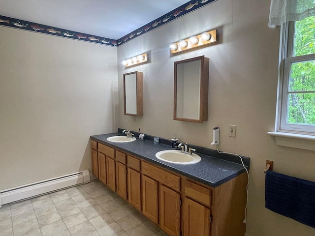 139 Rice Brook Dr, Stoddard, NH 03464 - full bathroom featuring a baseboard heating unit and double vanity