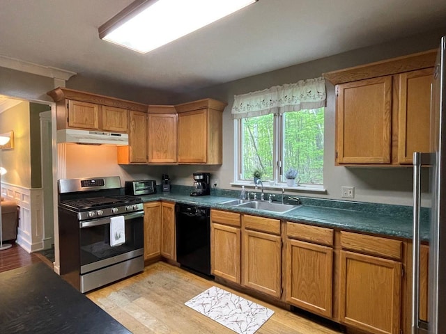139 Rice Brook Dr, Stoddard, NH 03464 - kitchen with black dishwasher, stainless steel gas stove, under cabinet range hood, a sink, and dark countertops