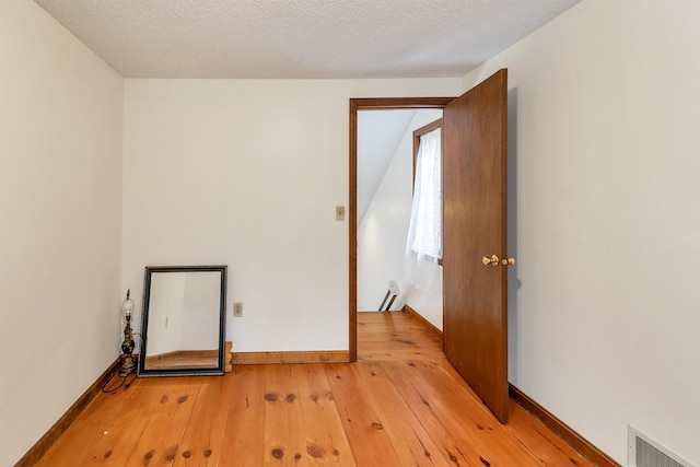 72 Mather Rd, Tamworth, NH 03886 - unfurnished room with light wood finished floors and baseboards