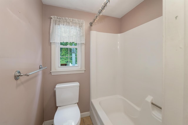 1 Pepperell Cir, Nashua, NH 03062 - bathroom with toilet, baseboards, and shower / tub combination