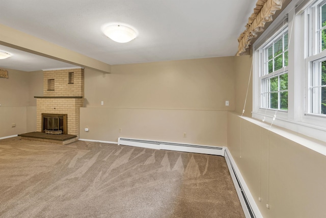 1 Pepperell Cir, Nashua, NH 03062 - unfurnished living room with carpet flooring, a baseboard radiator, a fireplace, baseboards, and beamed ceiling