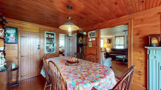 358 S Main St, Whiting, VT 05778 - dining space with wooden walls, wood finished floors, and wood ceiling