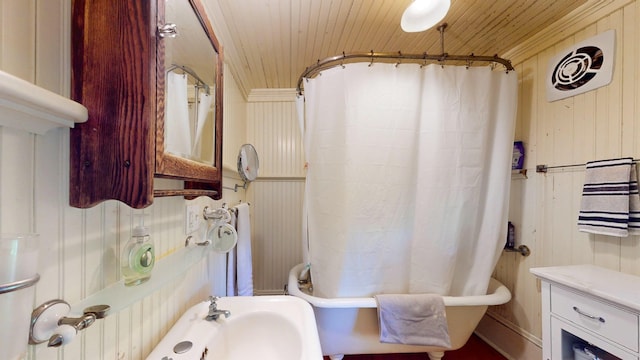 358 S Main St, Whiting, VT 05778 - bathroom with wood ceiling and shower / tub combo with curtain