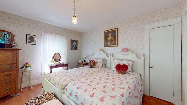 358 S Main St, Whiting, VT 05778 - bedroom with wood finished floors and wallpapered walls