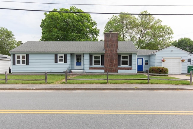 64 Fairview Ave, Nashua, NH 03060 - ranch-style house featuring a chimney and an attached garage