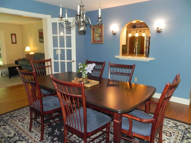 1782 Old Creamery Rd, Williston, VT 05495 - dining area featuring wood finished floors and a chandelier