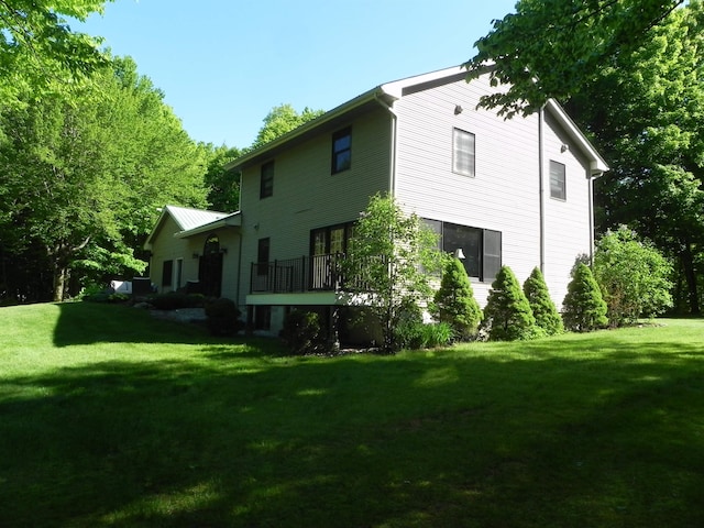 1782 Old Creamery Rd, Williston, VT 05495 - rear view of property with a lawn