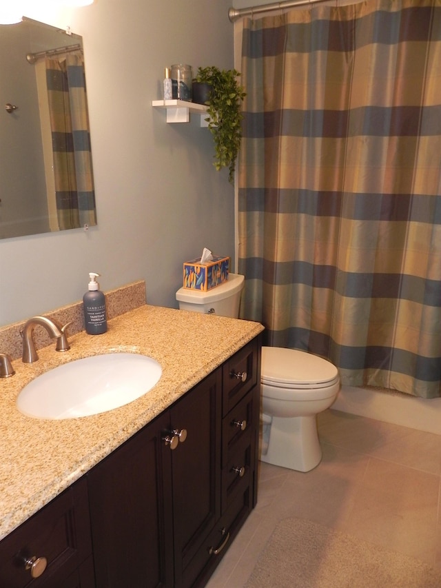 1782 Old Creamery Rd, Williston, VT 05495 - bathroom featuring toilet, vanity, tile patterned floors, and a shower with shower curtain