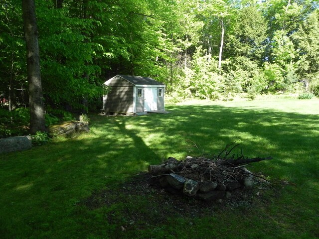 1782 Old Creamery Rd, Williston, VT 05495 - view of grassy yard with a forest view