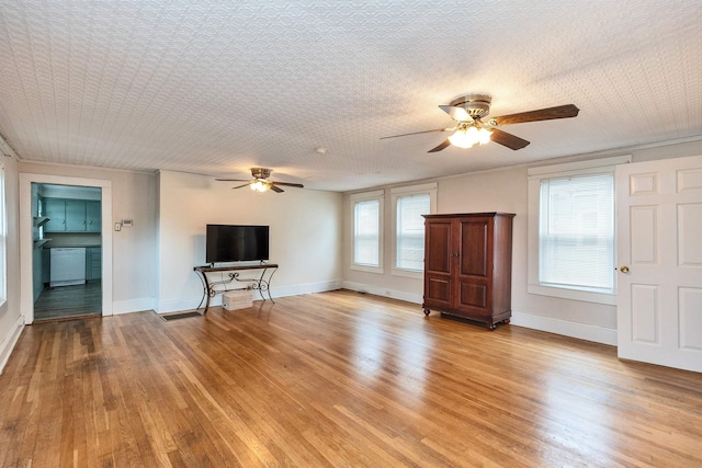 247 Prospect St, Manchester, NH 03104 - unfurnished living room featuring ceiling fan, light wood-type flooring, and baseboards