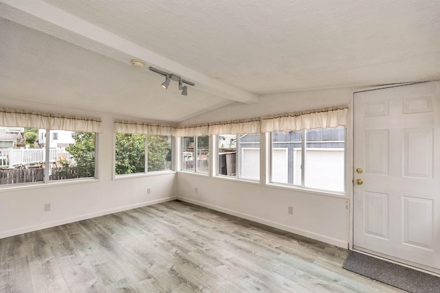 247 Prospect St, Manchester, NH 03104 - unfurnished sunroom featuring track lighting