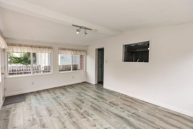247 Prospect St, Manchester, NH 03104 - spare room with wood finished floors and baseboards
