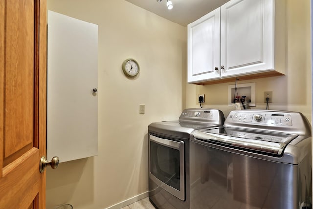 775 E Lake Rd, Ludlow, VT 05149 - laundry room with washer and dryer, cabinet space, and baseboards