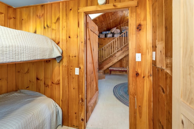22 Shore Dr, Middleton, NH 03887 - bedroom featuring wooden walls and wood finished floors