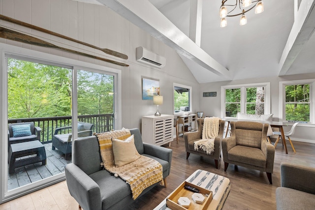 25 Hilltop Dr, Newbury, NH 03255 - living room featuring an AC wall unit, healthy amount of natural light, wood finished floors, a chandelier, and high vaulted ceiling