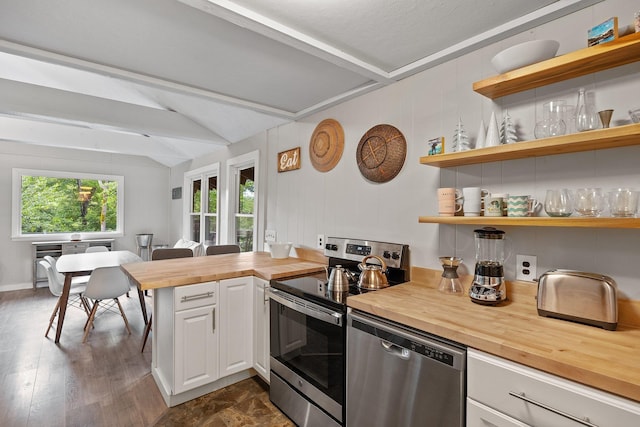 25 Hilltop Dr, Newbury, NH 03255 - kitchen with butcher block counters, stainless steel appliances, white cabinetry, open shelves, and a peninsula