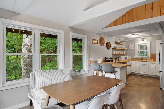 25 Hilltop Dr, Newbury, NH 03255 - dining space with dark wood finished floors, lofted ceiling, and plenty of natural light