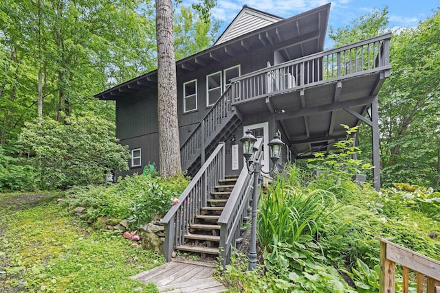 25 Hilltop Dr, Newbury, NH 03255 - back of house with stairs and a deck