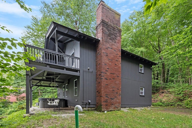 25 Hilltop Dr, Newbury, NH 03255 - back of house with a chimney