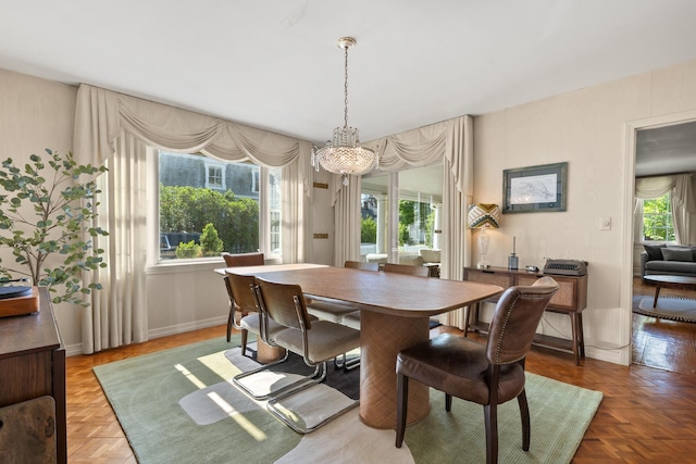 79 Silver St, Dover, NH 03820 - dining room with a chandelier and baseboards